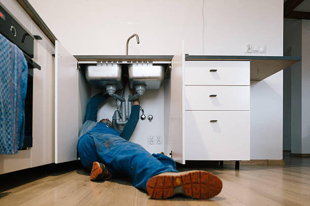 Professional Emergency Plumber technician working in Cumming, GA